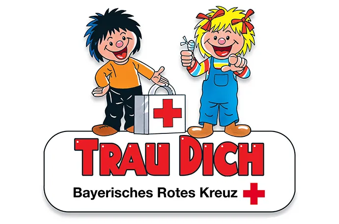 Das Logo mit zwei Comicfiguren vom Trau-Dich-Programm